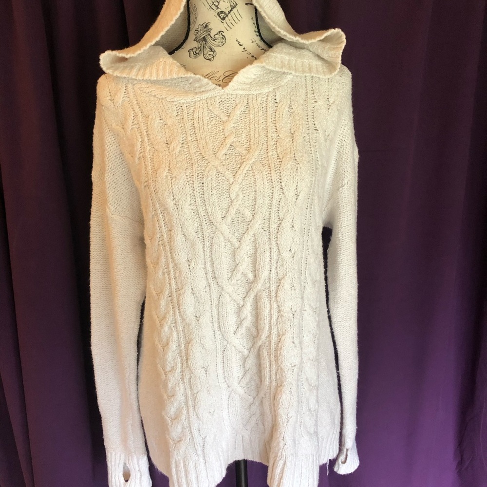 Girls off white/cream colored sweater with hood and thumb holes in sleeves.